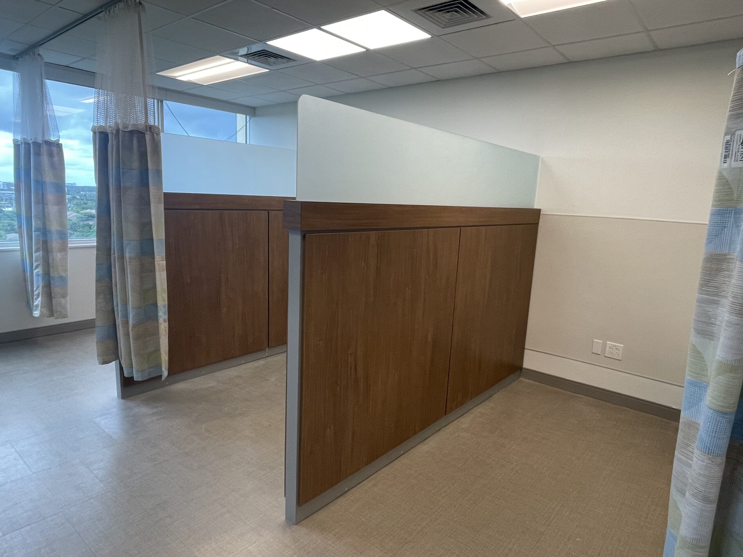 Private exam rooms with wooden dividers